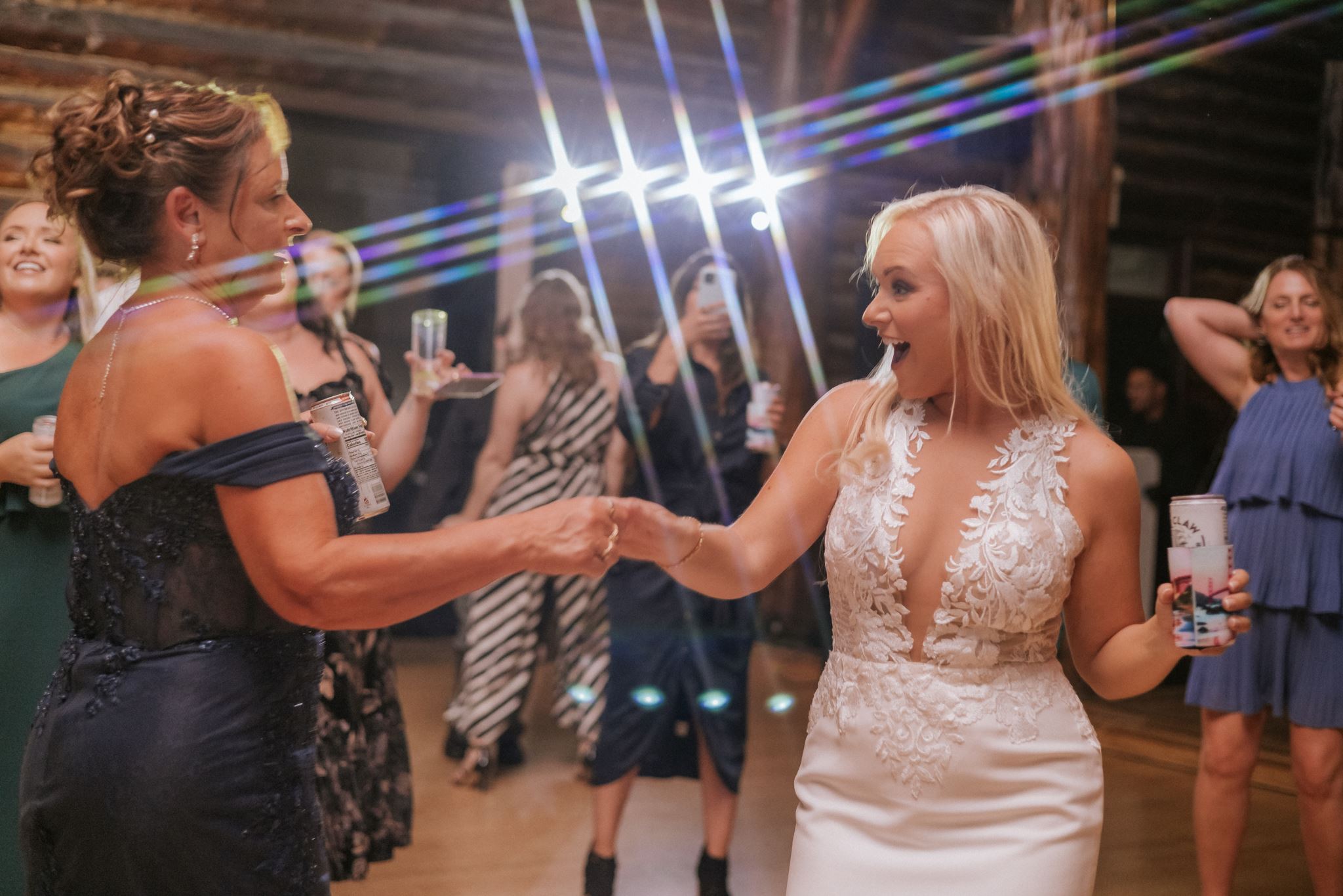 dancing with guests during a wedding reception at the Log Cabin in the Presidio