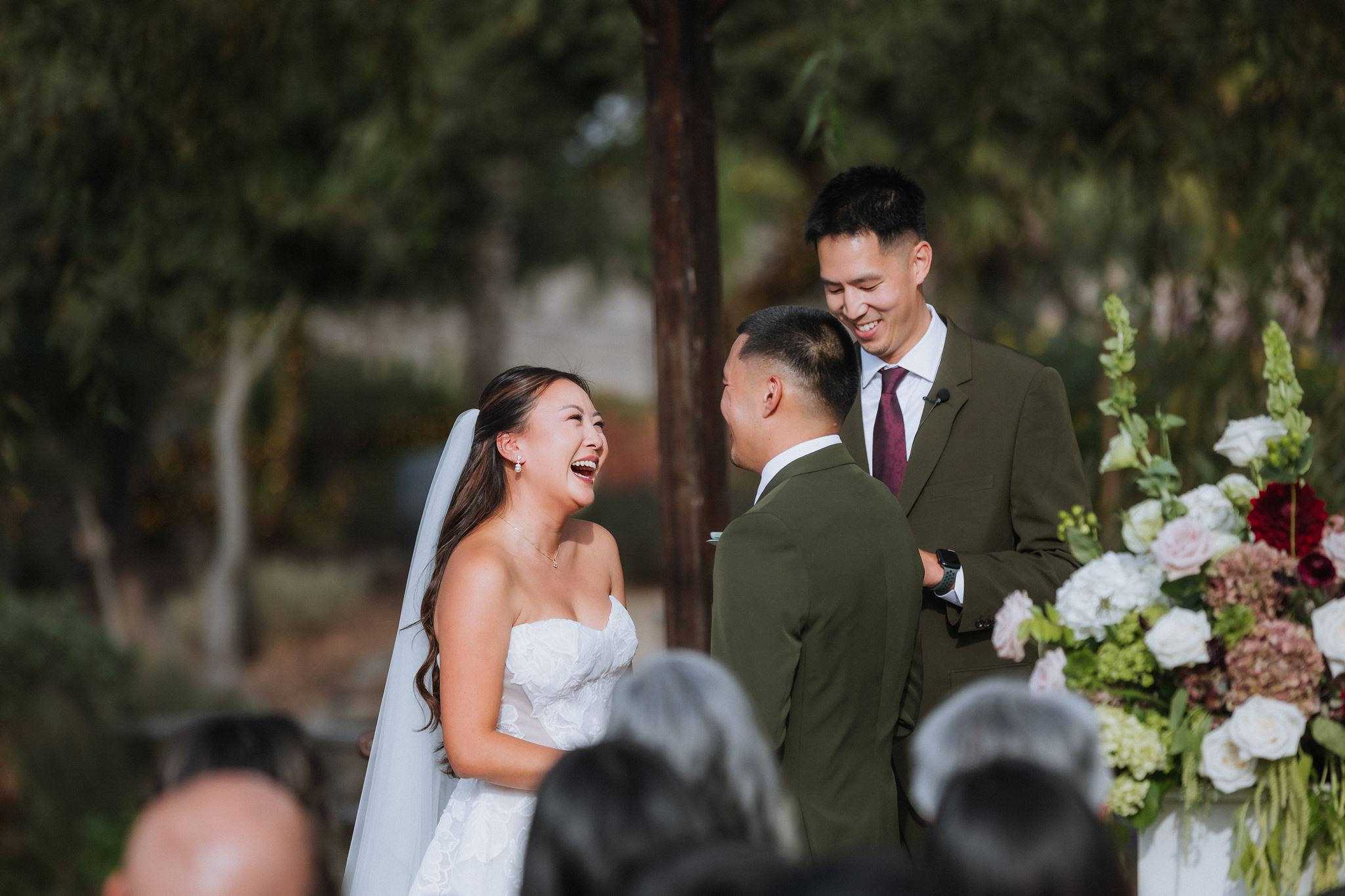 Couple laughing during their ceremony