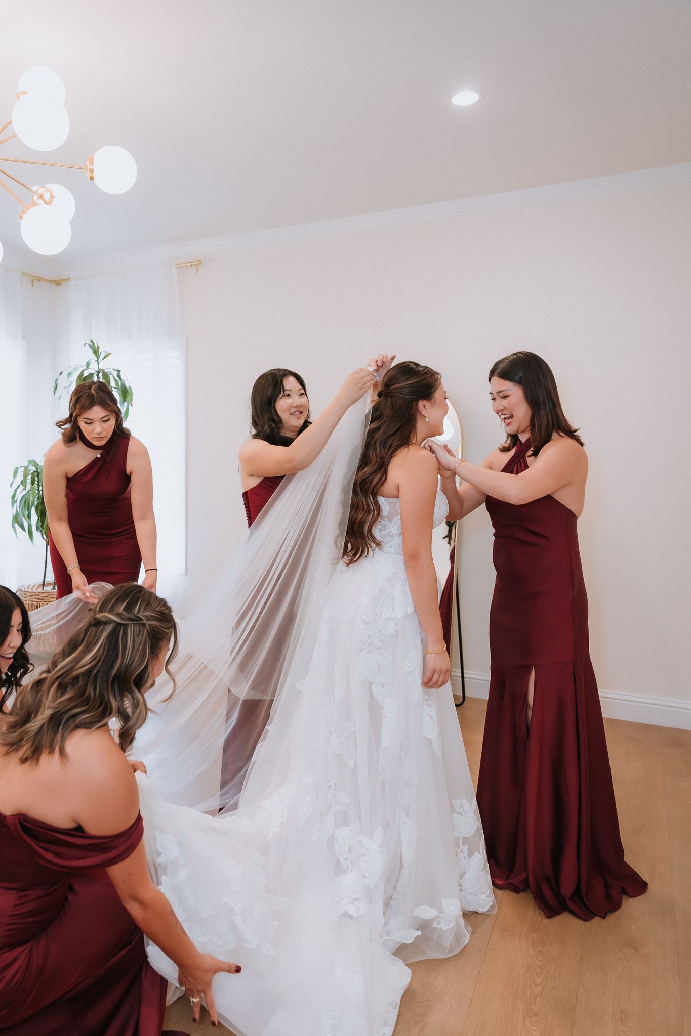 Bride getting ready with her wedding party before the ceremony at Nella Terra