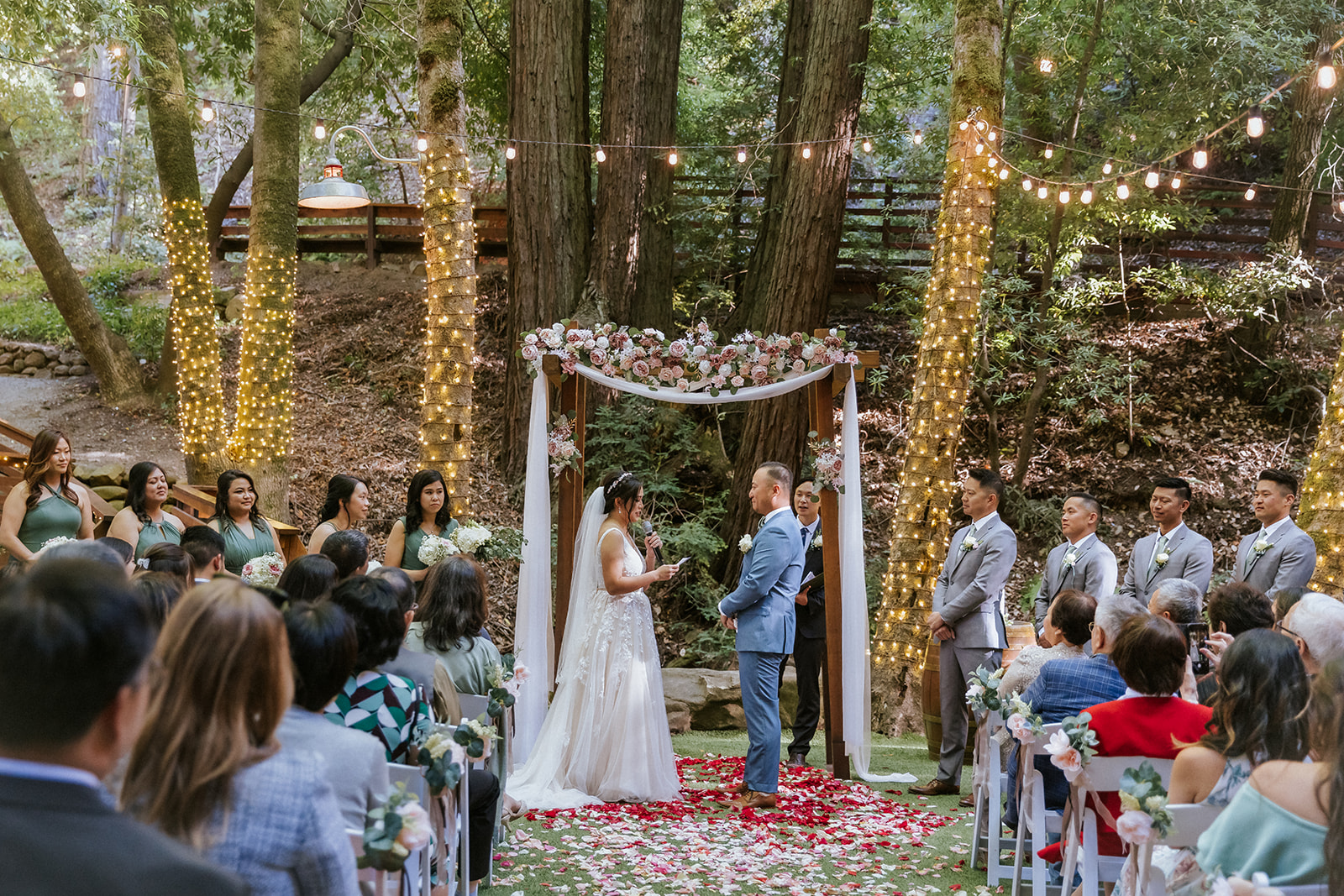 Outdoor wedding ceremony beneath the redwoods at Saratoga Springs in California