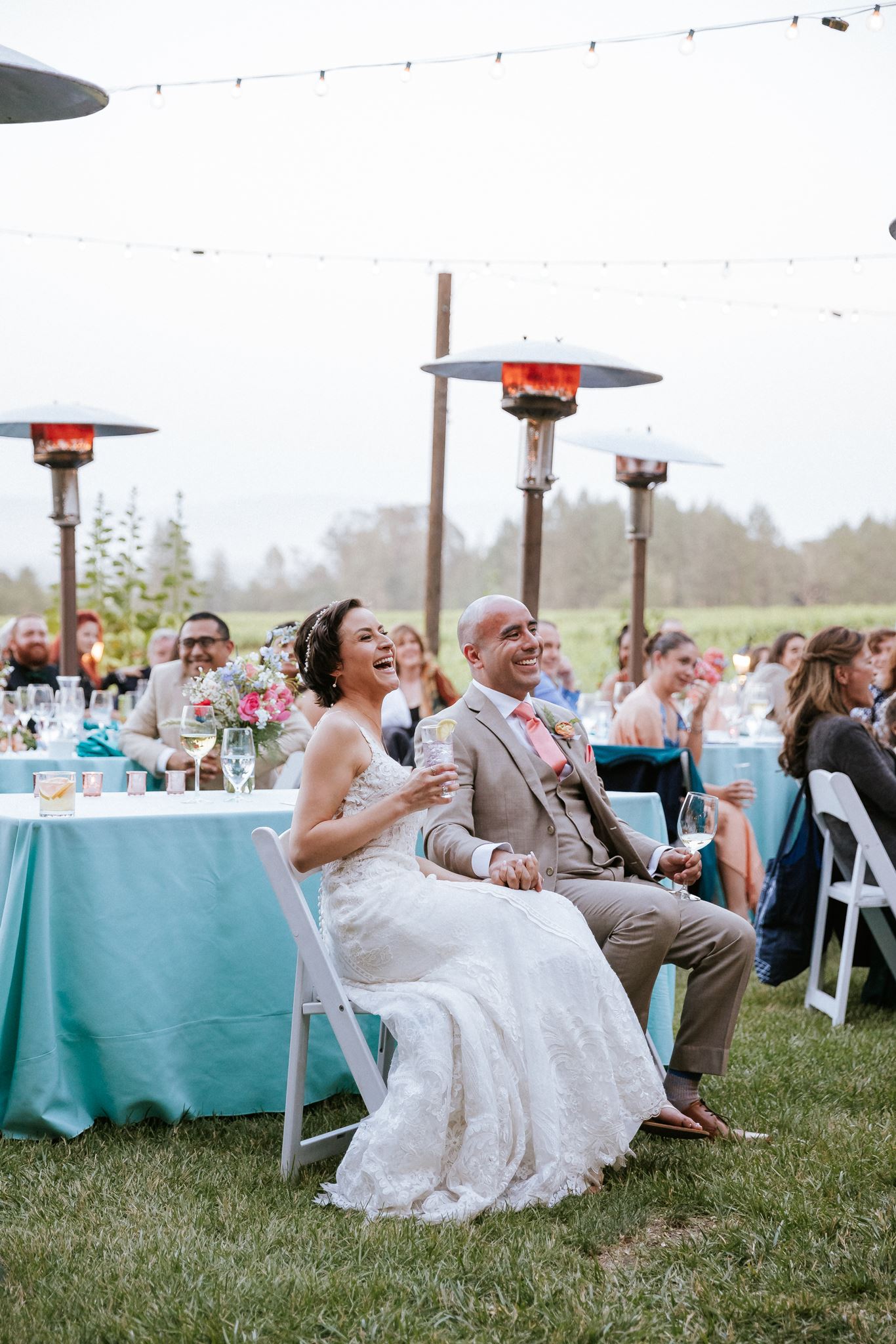 Couple and wedding guests during an outdoor reception at Vine Hill House